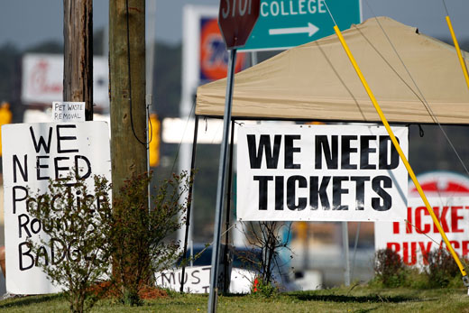 Hottest ticket around: Scalpers banners tell the story