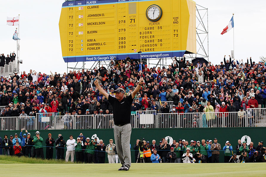 Clarke celebrates his Open victory on the 18th green