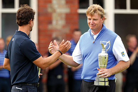 To the victor go the spoils: Els commiserates with Scott, one of his best friends on Tour