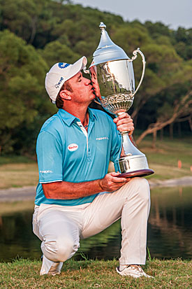 Hend celebrates with the silverware
