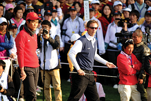 Colsaerts stalks his final putt in his win against China's Liang Wen-chong