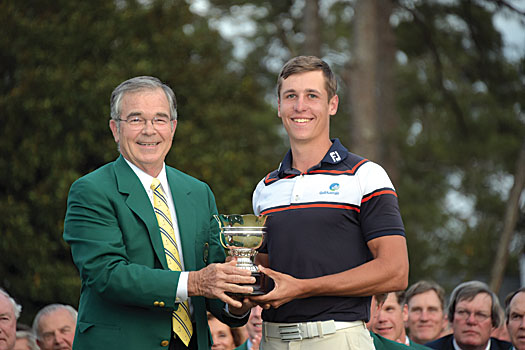 Oliver Goss receives the Silver Cup from Augusta Chairman Billy Payne