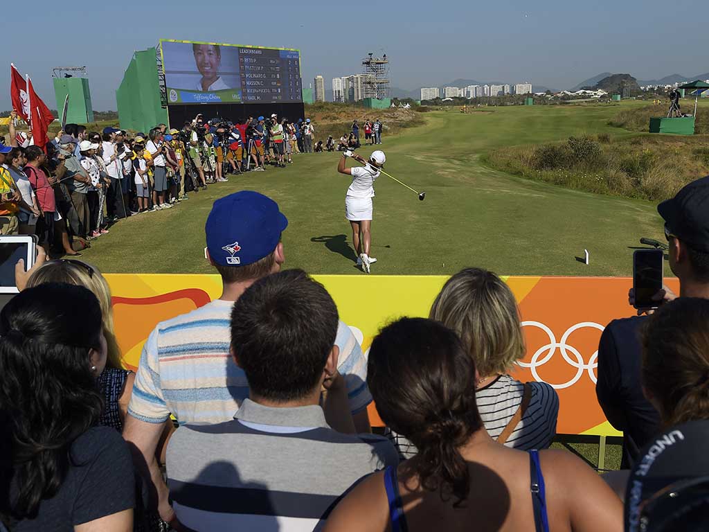Tiffany Chan hits the first-ever tee shot by a Hong Kong golfer in the Olympic Games