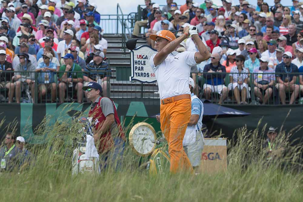 Rickie Fowler took the first-round lead with a 65
