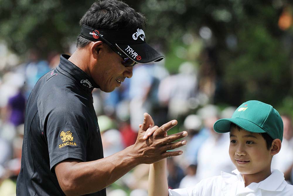 Thongchai Jaidee and his son Titituch at the par-3 competition of 2010 Masters