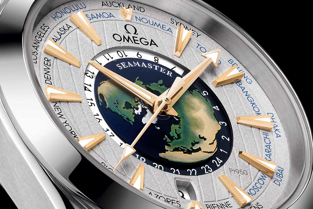 A sapphire crystal central dial with a hand-crafted enamel world map
