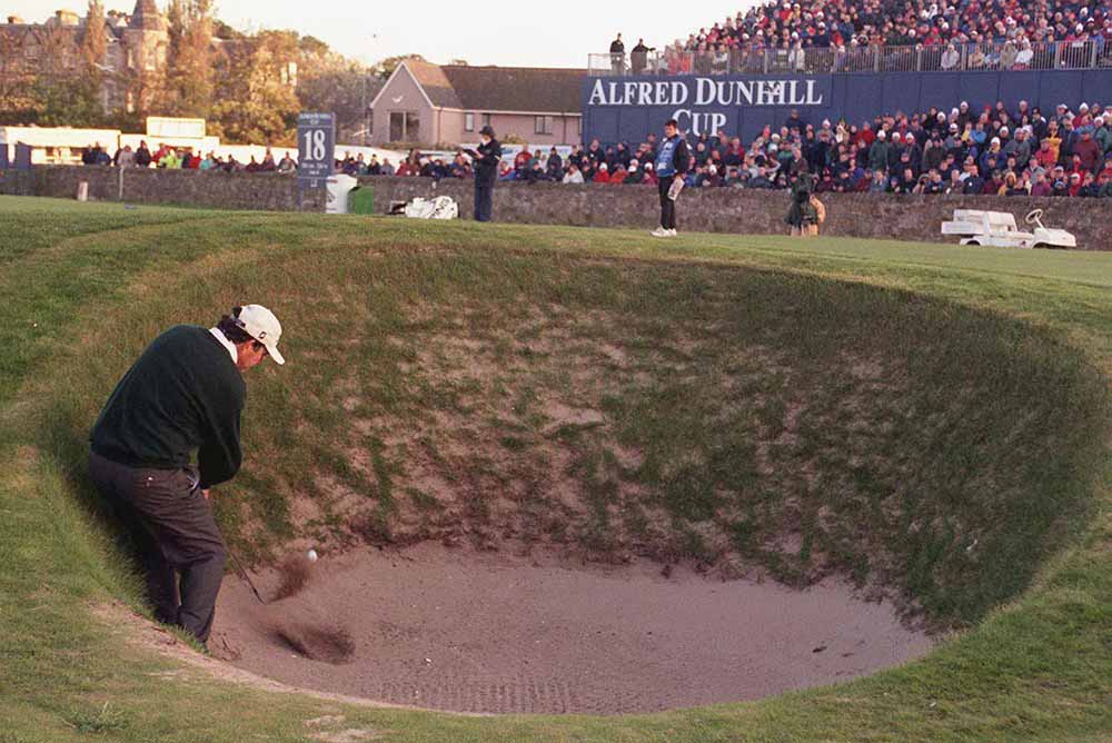 David Frost plays from the bunker on the 17th at St Andrews in 1998