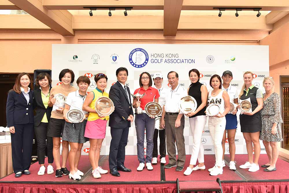 Yoshihiro Nishi, President of the HKGA, presents trophies to all Esprit HK Ladies Open & Mid Amateur Championships winners