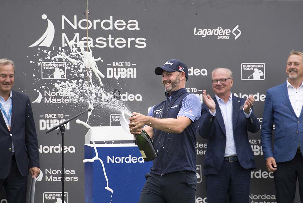 Englishman Paul Waring celebrates winning the Nordea Masters