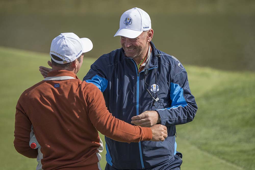 European Team caption Thomas Bjørn congratulates Paul Casey