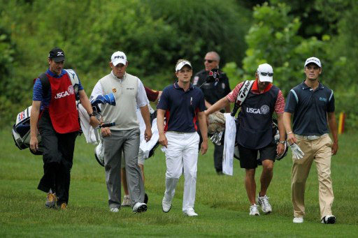 Westwood, Donald, and Kaymer walk together during the 1st round of the 111th US Open
