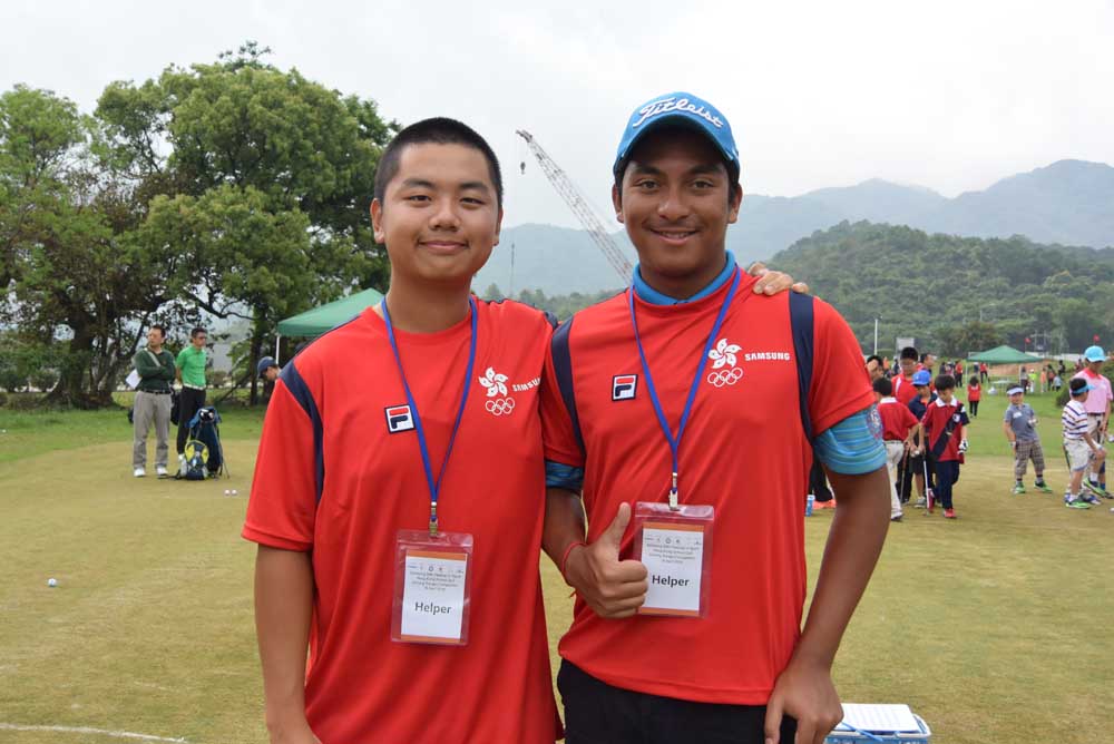 Humphrey Wong and Leon D'Souza help out at the event